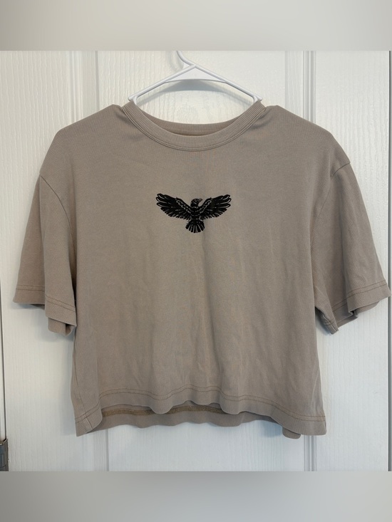 Octopied Mind Tops - Women's Taupe Cropped Tee with Black Eagle Graphic